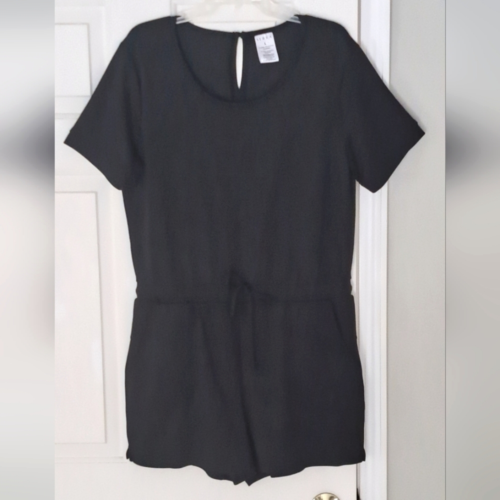 Serra black lined pockets romper.  Size  L.